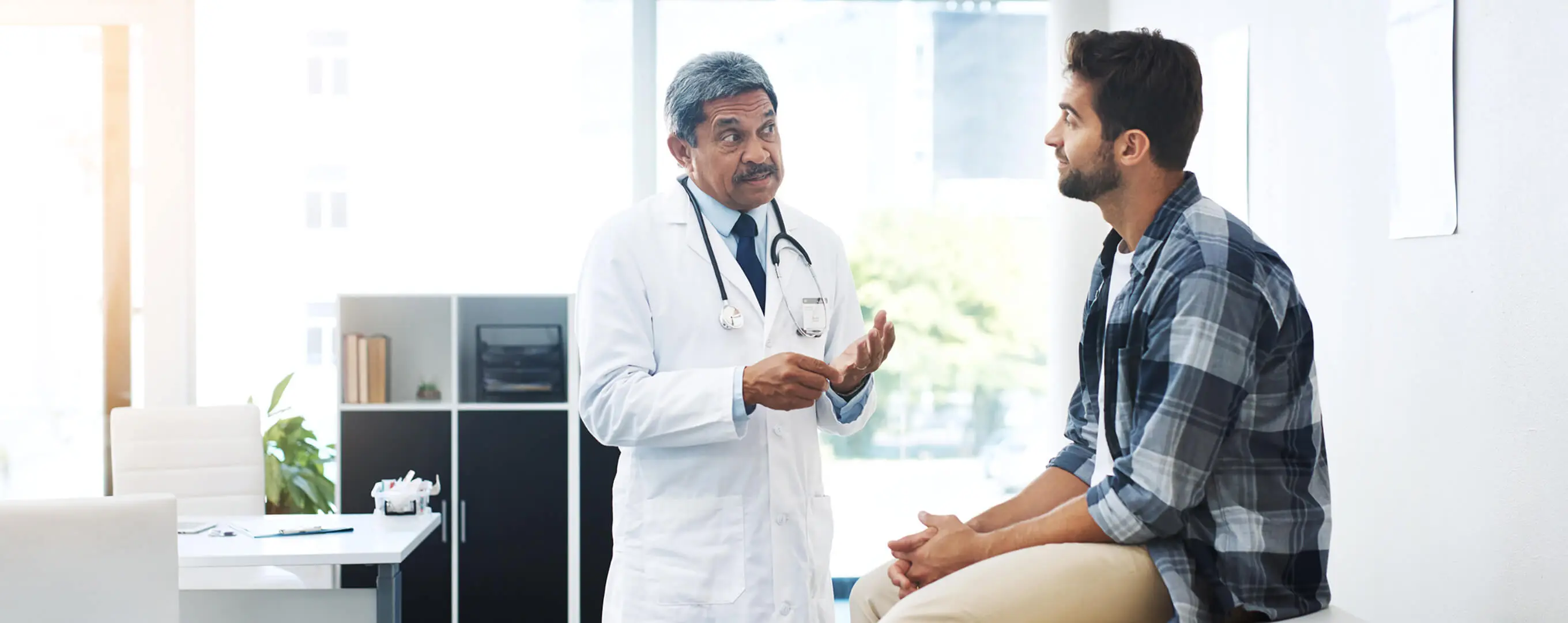 A doctor talks to a patient.